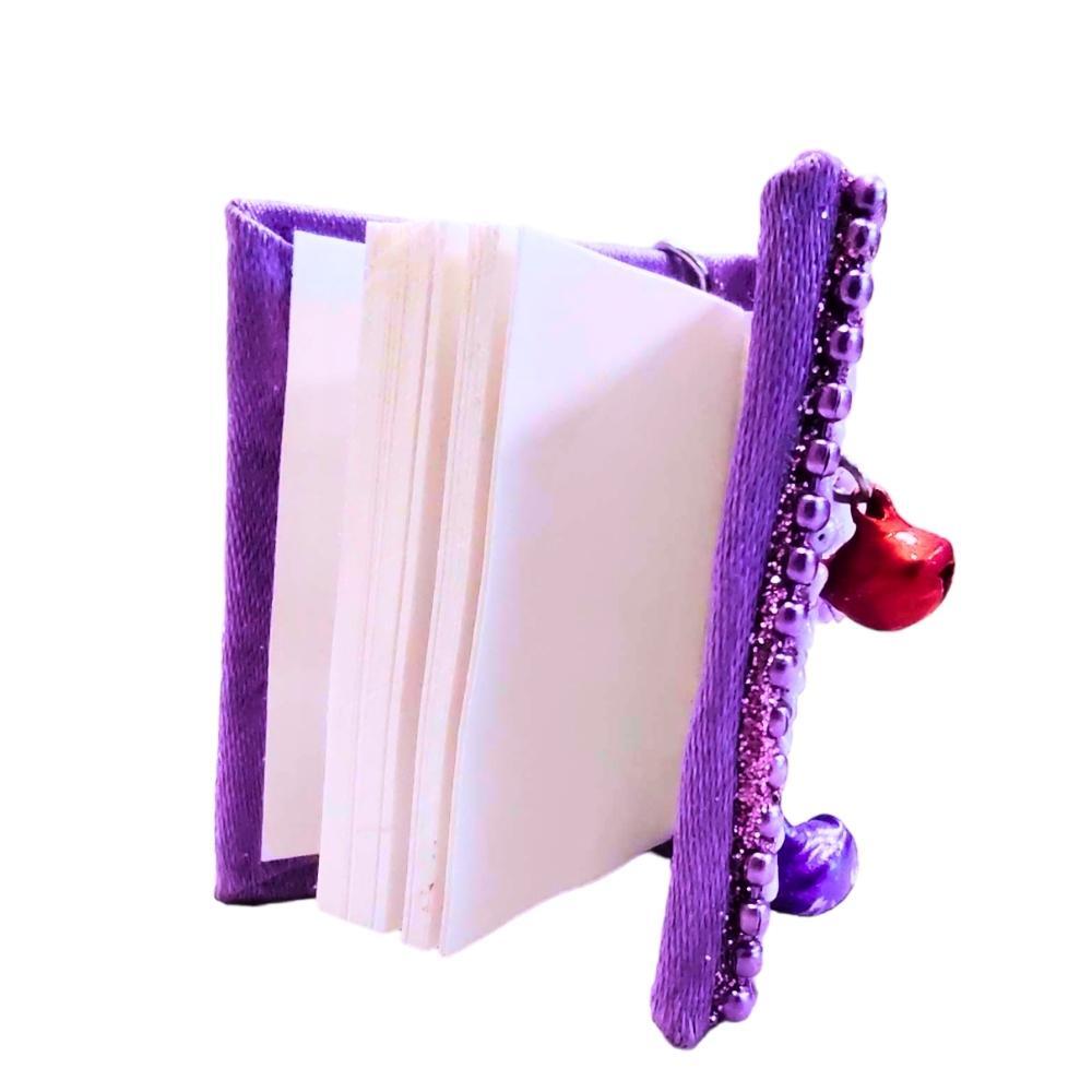Libreta llavero c/mostacillas y sonajero color pastel