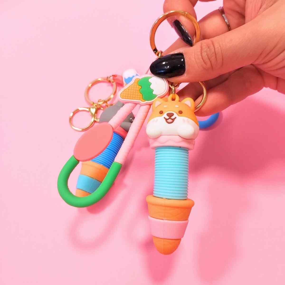 Juego Animalitos en cucurucho tubular c/sonido pop it y llavero