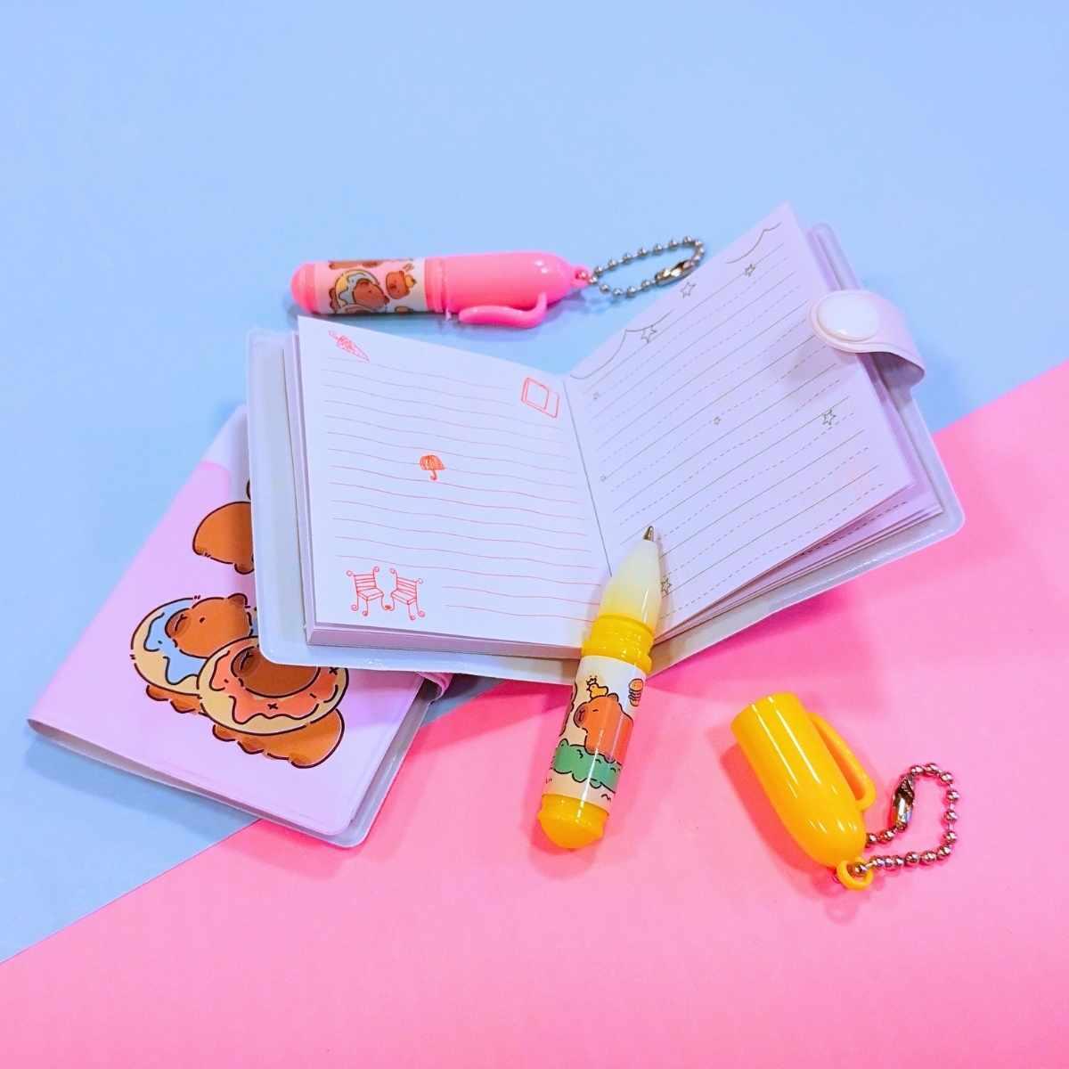 Libreta mini c/boligrafo Capybara
