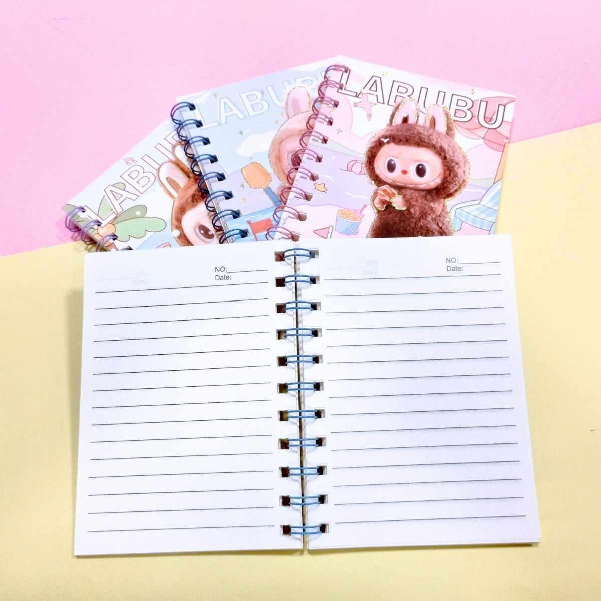 Libreta A6 Labubu c/espiral linea dorada - 80 hojas rayadas