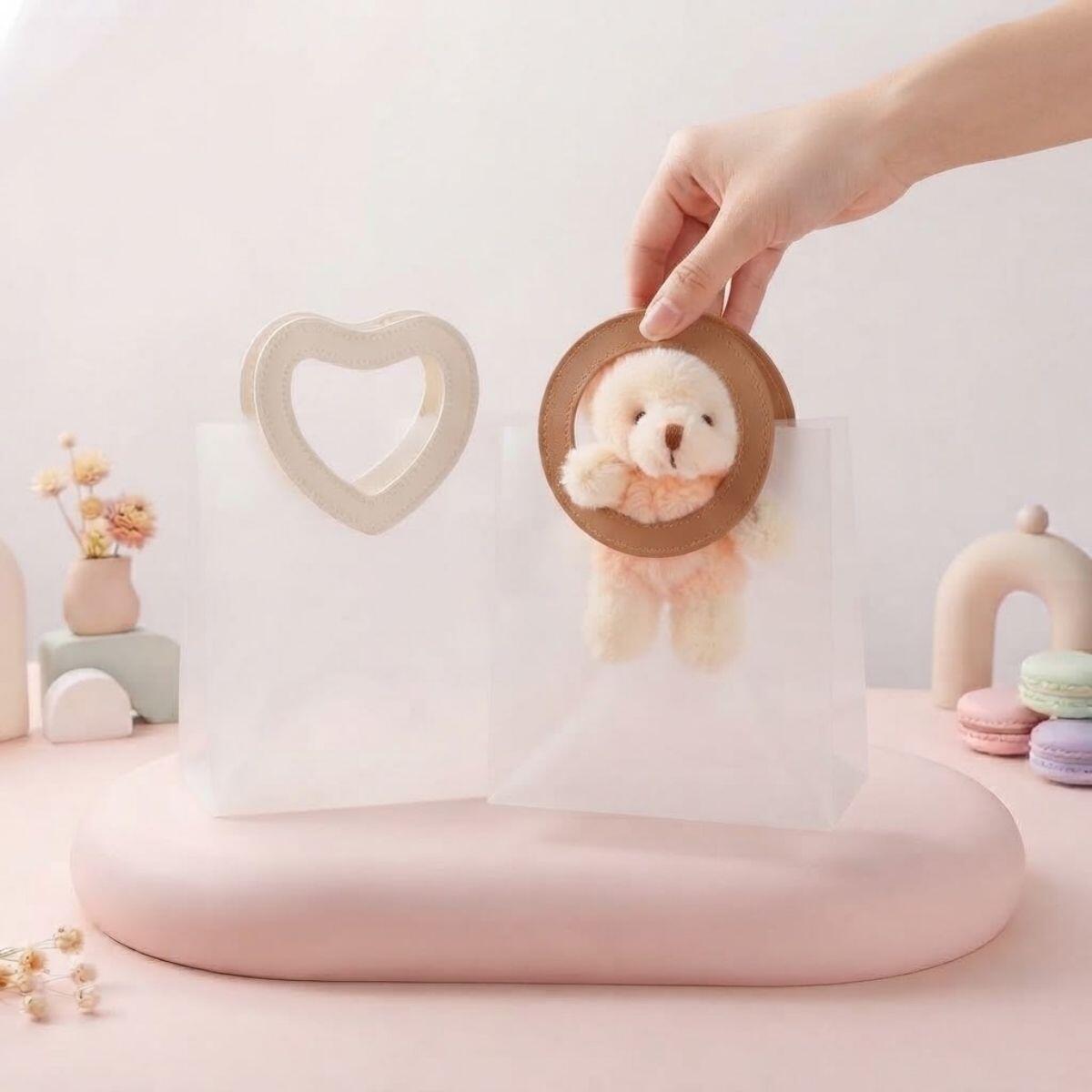 Bolsa de regalo plastica transparente c/manija redonda 22x21x11 cm