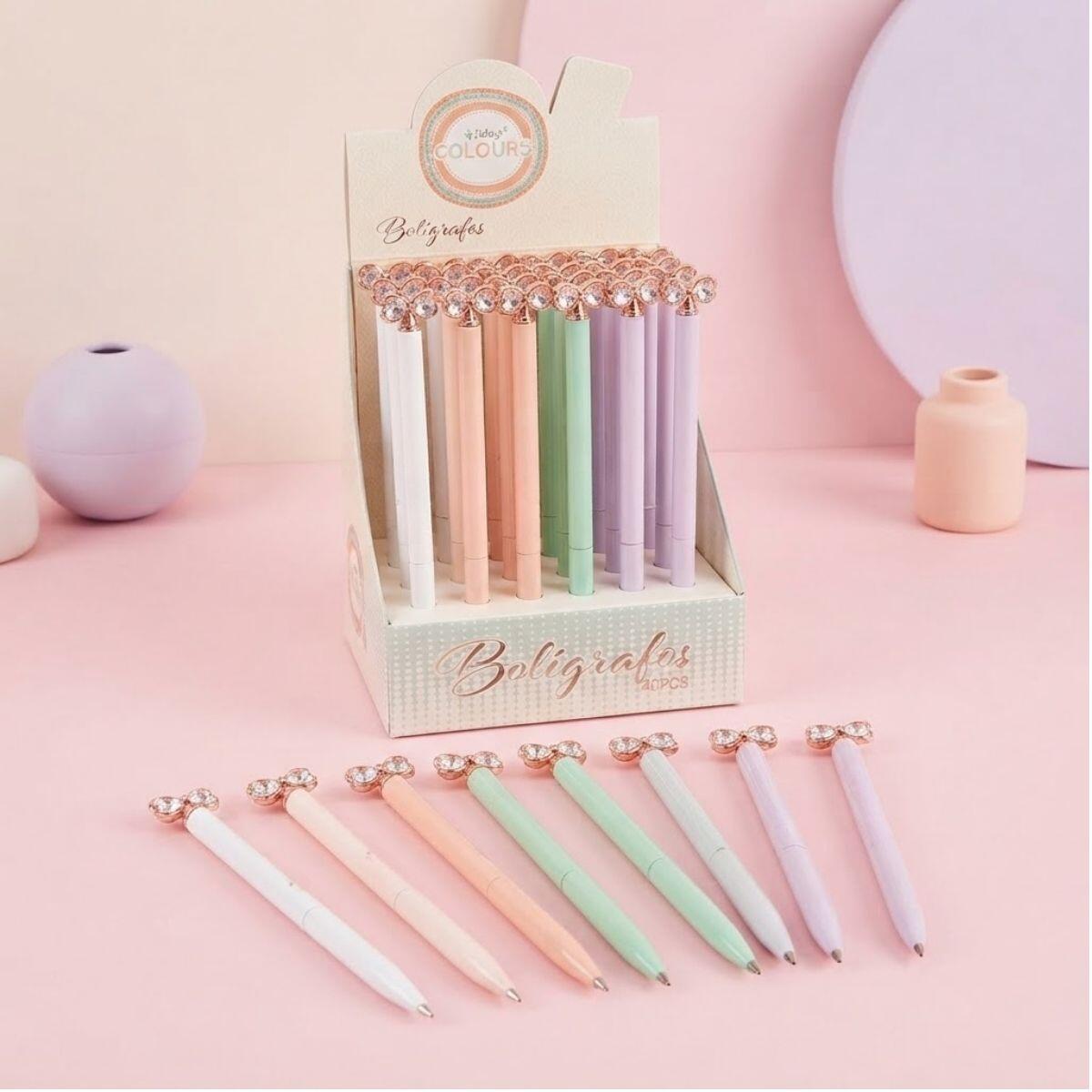 Boligrafo metal color pastel retractil c/giro y aplique lazo